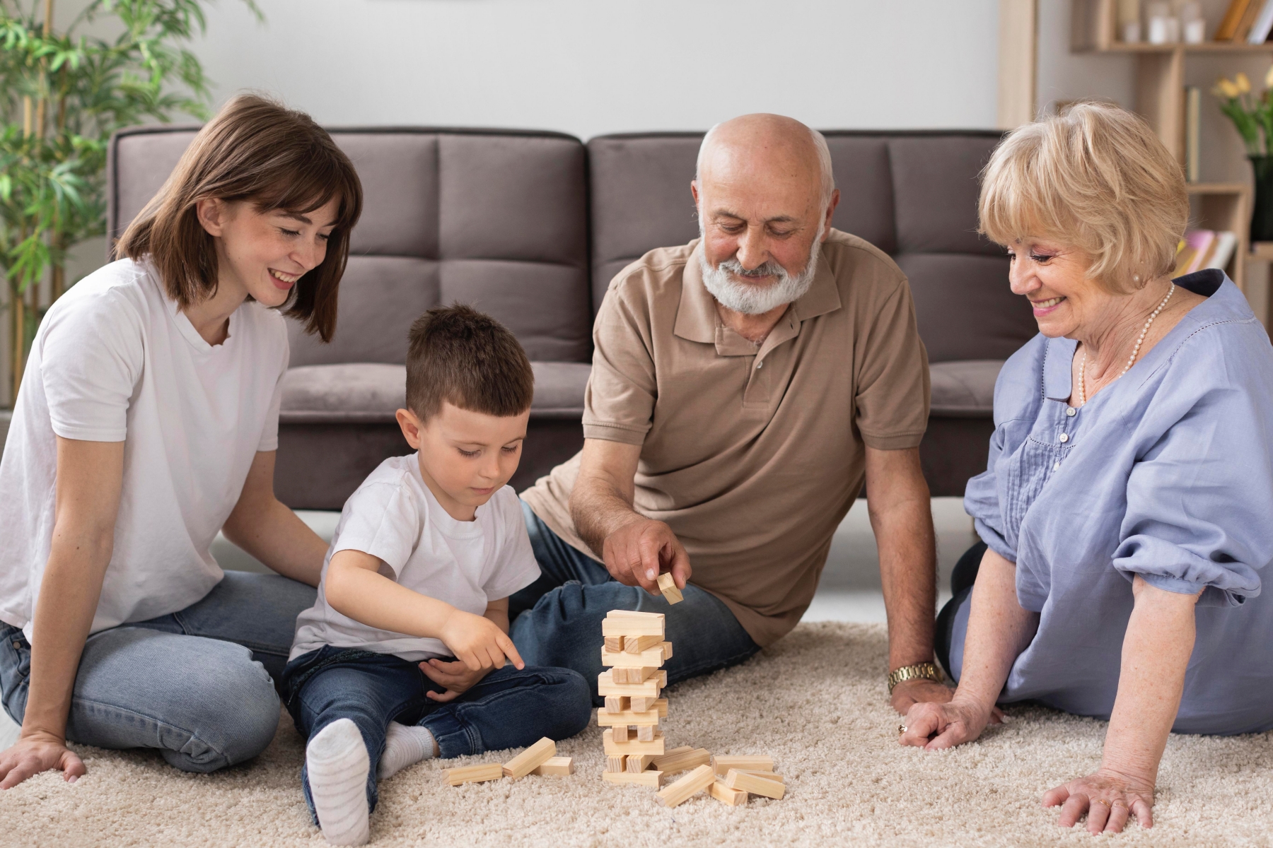 whole family playing with wooden toys